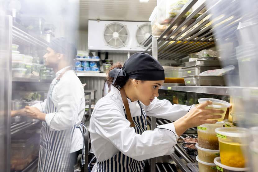 People working in a commercial kitchen